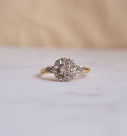 Bague circulaire Art Déco en Or jaune et Or blanc 18 carats sertie de Diamants