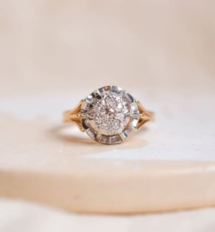 Bague circulaire en Or jaune et Or blanc 18 carats pavée de Diamants