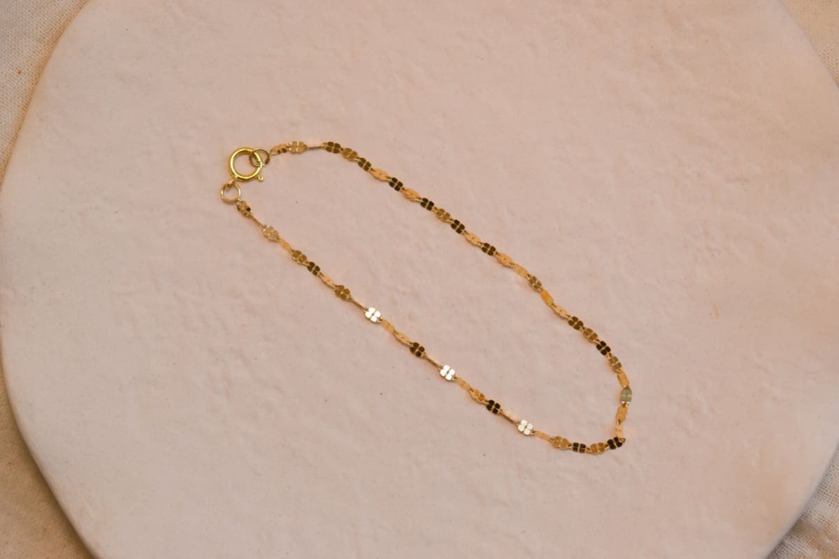 Bracelet ancien en Or jaune 18 carats à maille quadrilobée