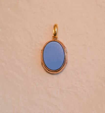 Pendentif ouvrant en Or jaune 18 carats ornée de 2 plaques d'Agate