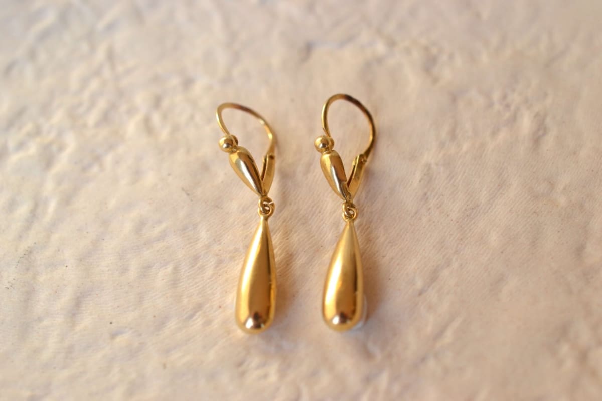 pendants d'oreilles dites fileuses