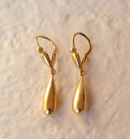pendants d'oreilles dites fileuses