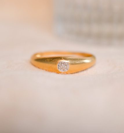 Bague Jonc en Or jaune 18 carats sertie d'un Diamant