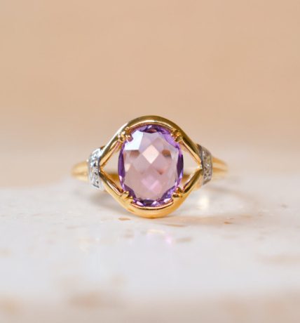 Bague œil en Or jaune 18 carats sertie d'une Améthyste et de Diamants