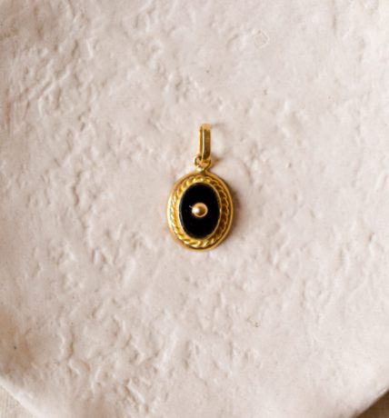 Pendentif en Or jaune 18 carats serti d'une plaque d'Onyx centré d'une bille d'Or