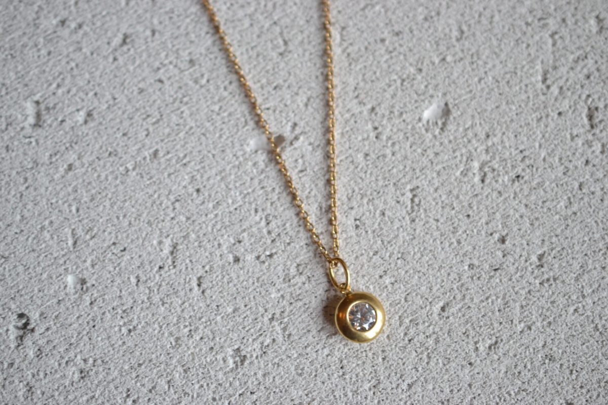pendentif éthique rond serti clos