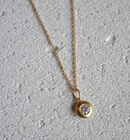 pendentif éthique rond serti clos